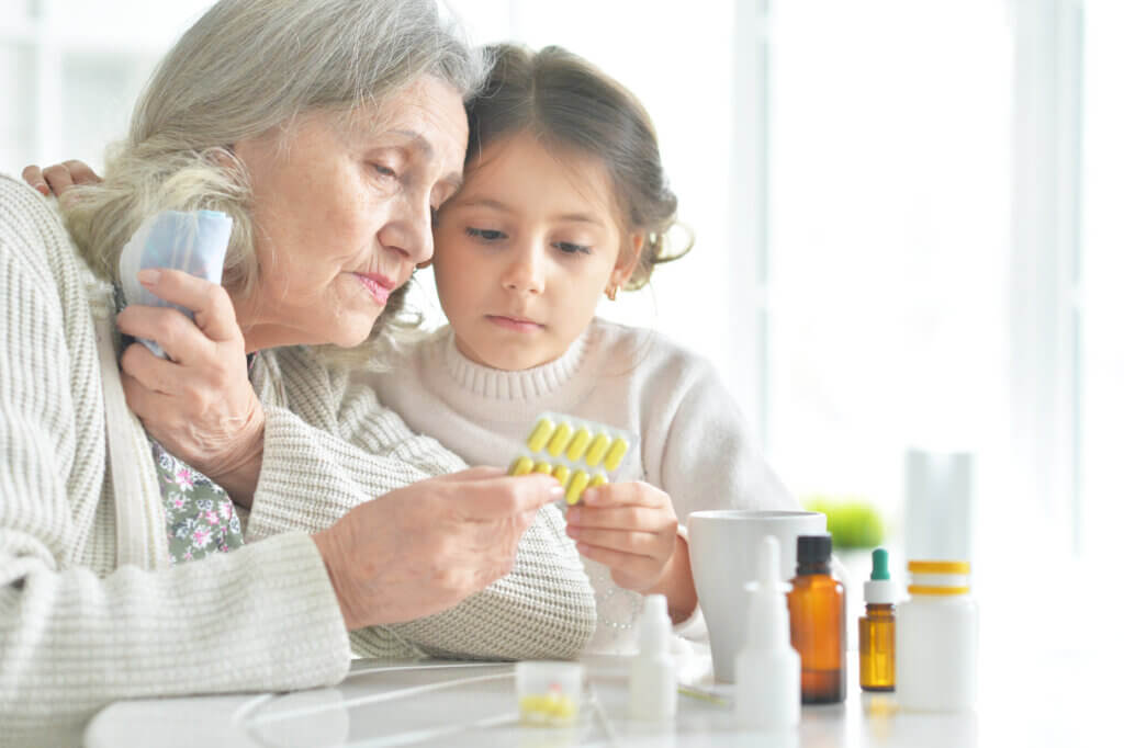 Granddaughter helping with medication adherence