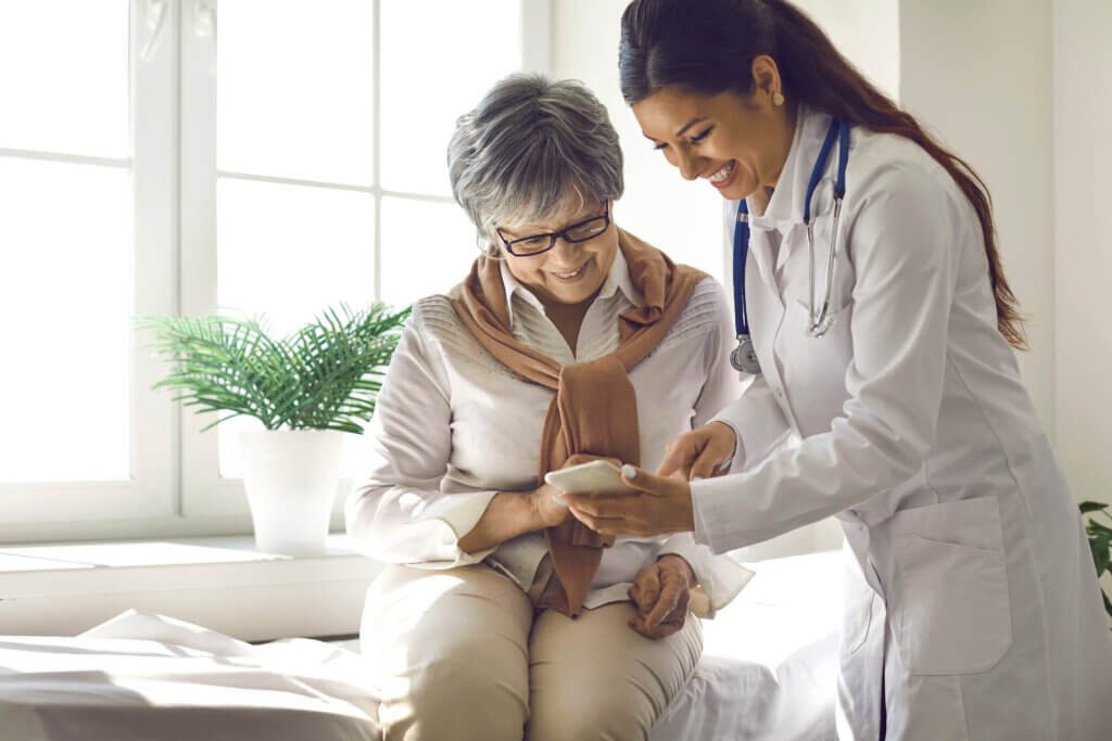 Doctor patient conversation with patient healthcare marketing materials