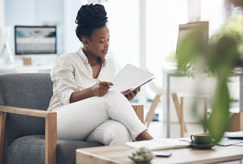 Woman reviews health print media and health information