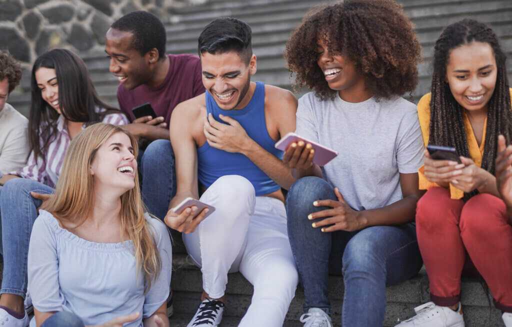 Digitally native, diverse Gen Z group hangs out on their phones