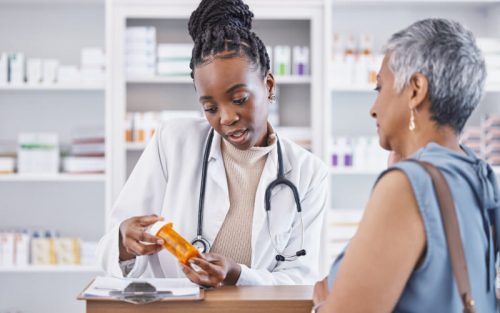 pharmacist helping lady